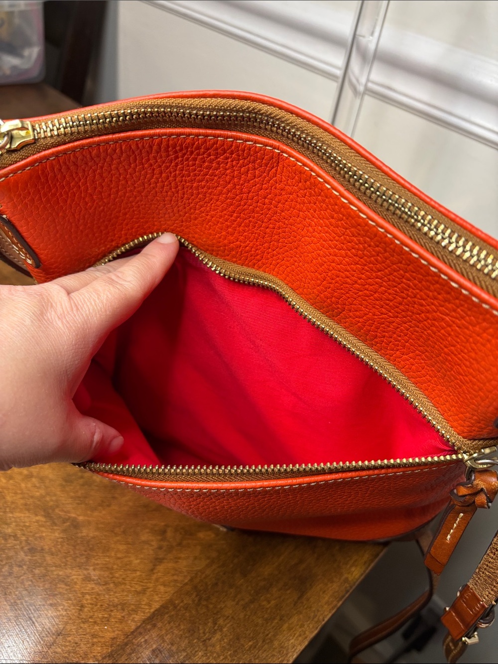 Dooney & Bourke Pebbled Grain Crossbody Orange Leather Bag with Red Interior - Picture 12 of 16